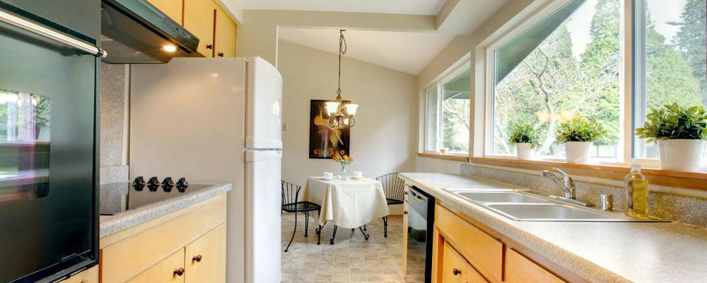 Installing assembled kitchen cabinets saves money and space