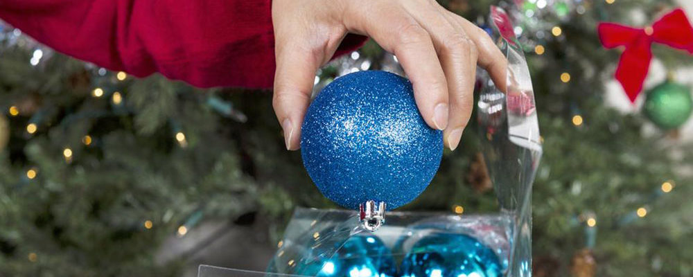 Tips for deciding if a Santa tree topper is right for your tree