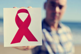 What are the causes and symptoms of AIDS?